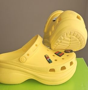 Yellow platform crocs